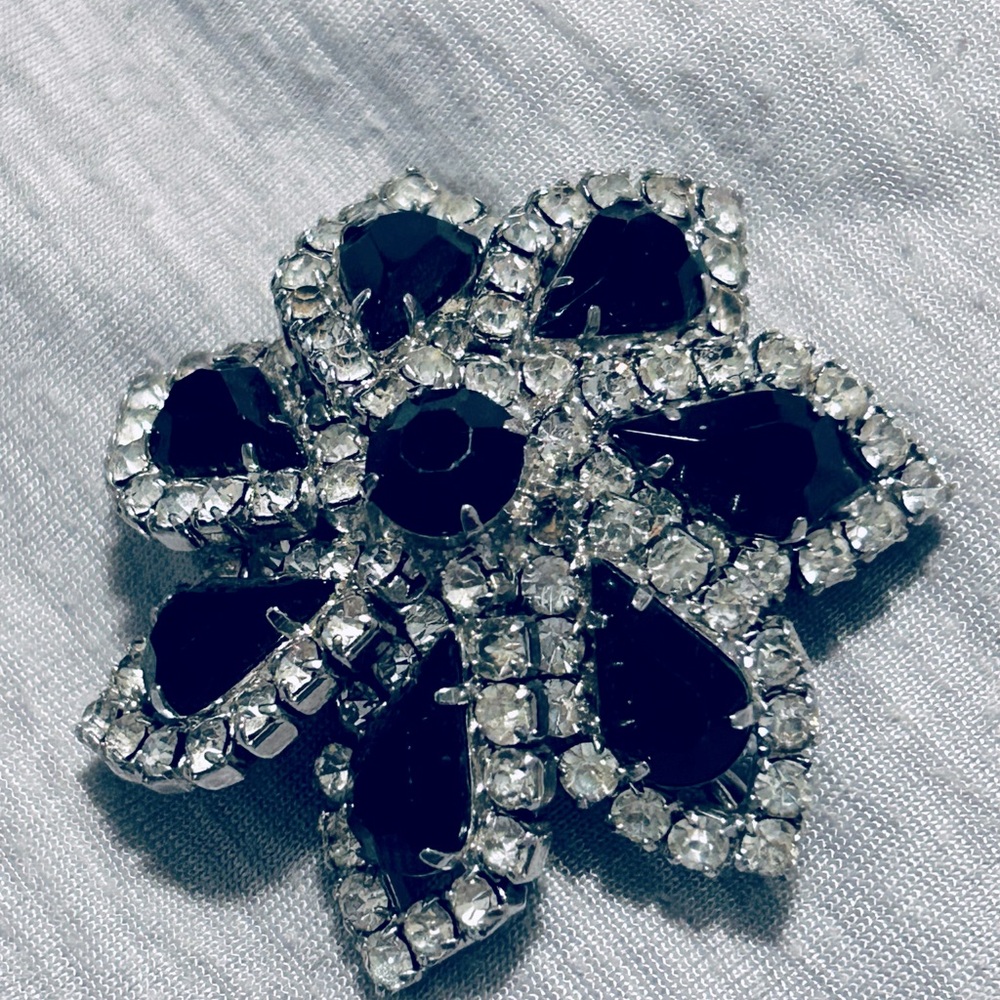 Cathe Vintage stamped elegant Black, Silver Rhinestone Floral Brooch “C” clasp.